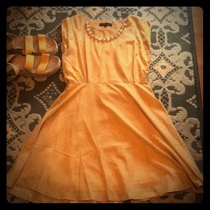 Mustard yellow spring/summer dress.